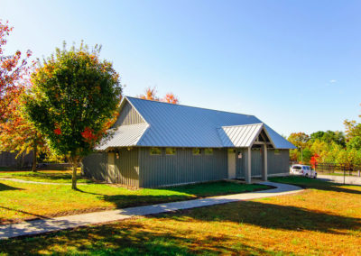 SIP panel building with pole barn look.