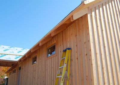 Board and batten siding on SIP panel home.