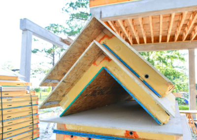 Eco-Panels patented corner stacked in a bundle before being constructed.