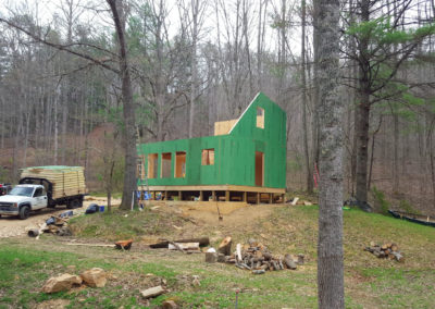 Small two-story home being built with structural insulated panels.